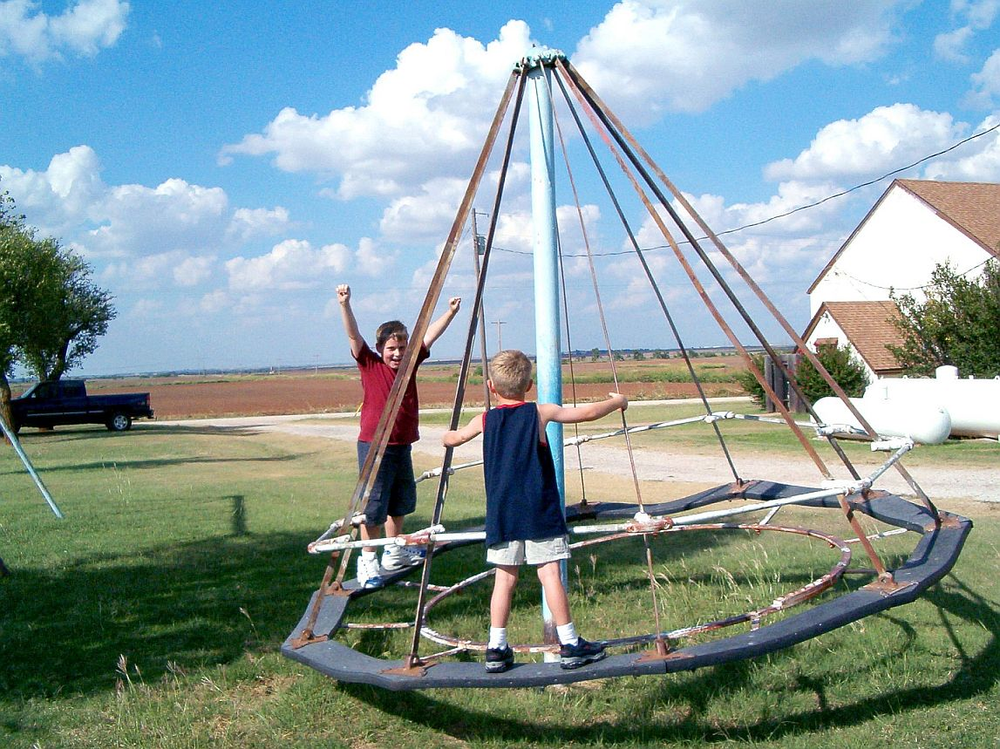 A pic showing two boys playing in the park | Rio Vista Group